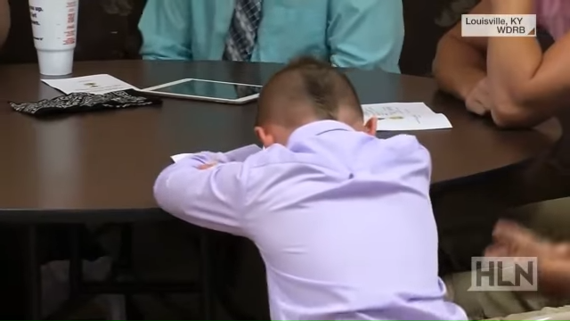 Boy honored for saving his dad