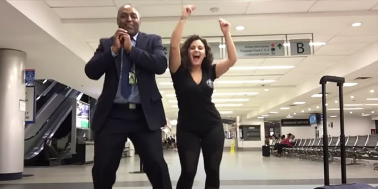 woman-dances-in-airport